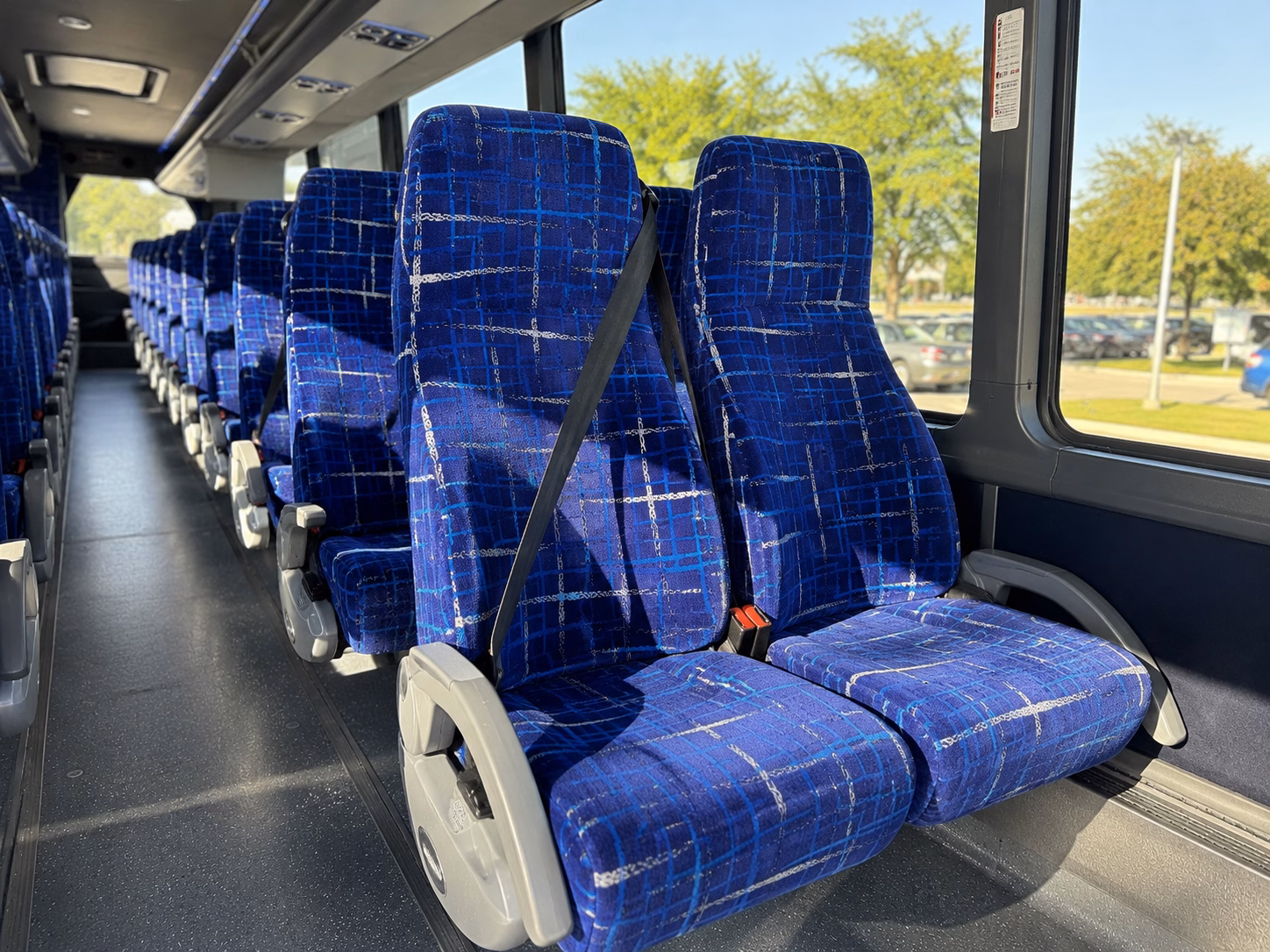 moving a full grade level compare 56 passenger charter buses for durham schools